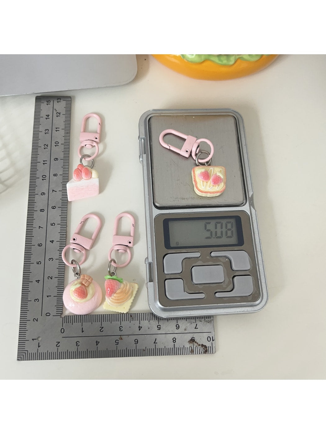 Keypus - Cartoon Strawberry Pastry Bag Charm Keychain