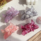 Side view of Beau butterfly decorated hair claw clip highlighting clip mechanism