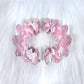 Beau wavy pink hair clip styled in model's hair from front angle
