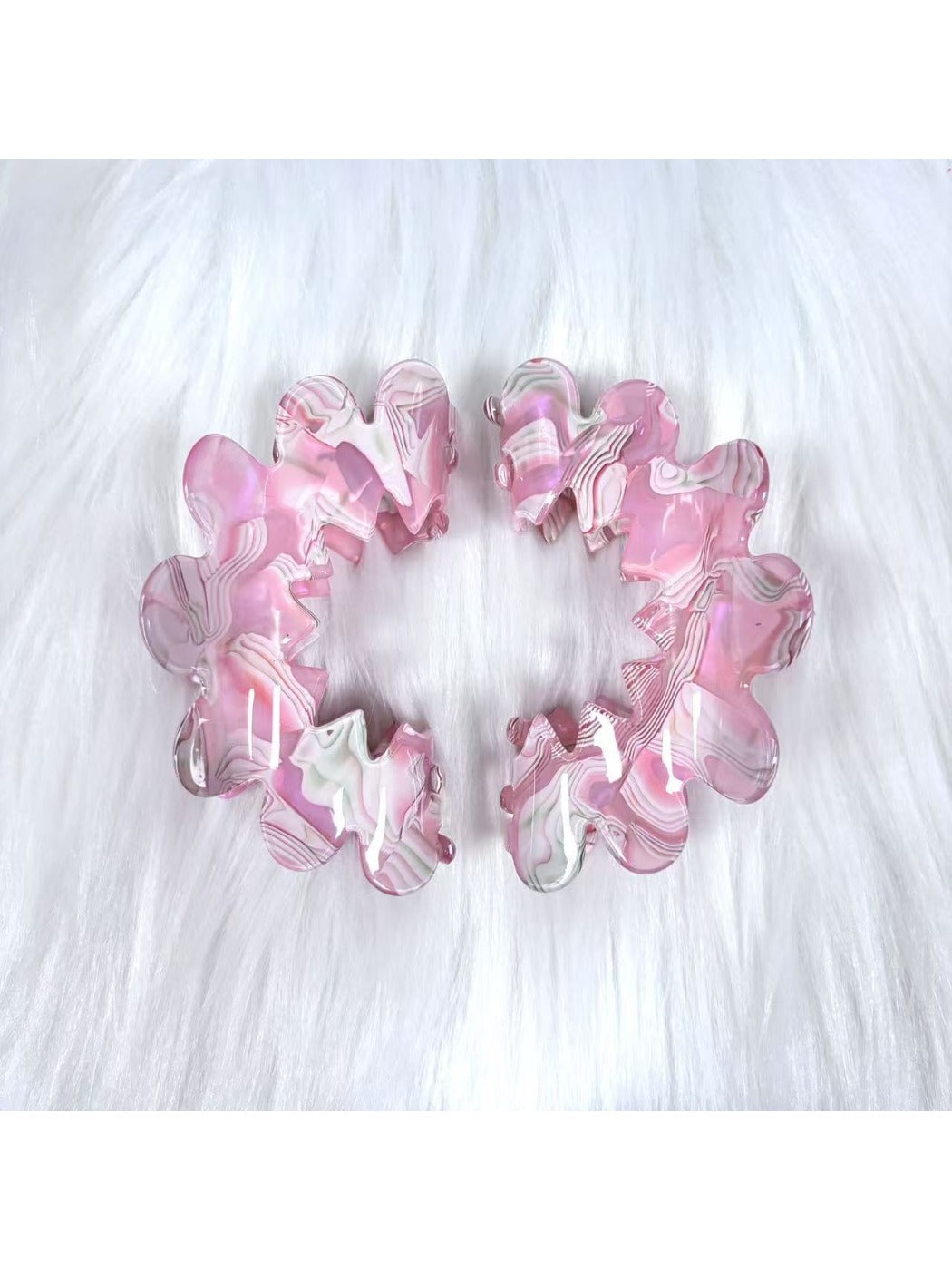 Beau wavy pink hair clip styled in model's hair from front angle