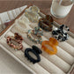 Beau - Retro Acetate Fiber Oval Claw Hair Clip