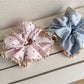 Close-up of Gifty sweet polka dot lace trim scrunchie in soft fabric