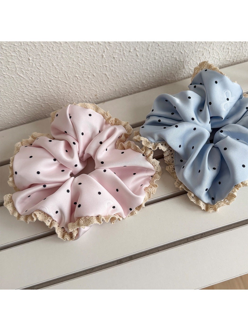 Close-up of Gifty sweet polka dot lace trim scrunchie in soft fabric