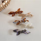 Beau retro bow hair clip made of tortoiseshell acetate, close-up view