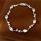 Lovra - Alloy Oval Flower Synthetic Zircon Bracelet
