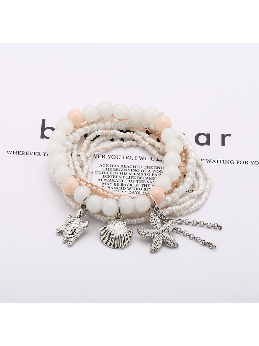 Side view of Lovra beaded bracelet highlighting layered rows of vibrant beads