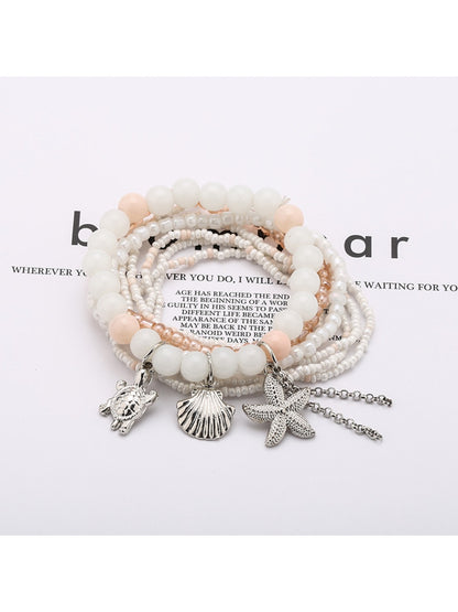 Side view of Lovra beaded bracelet highlighting layered rows of vibrant beads