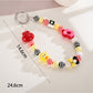 Keypus - Cartoon Acrylic Bow Star Beaded Phone Charm