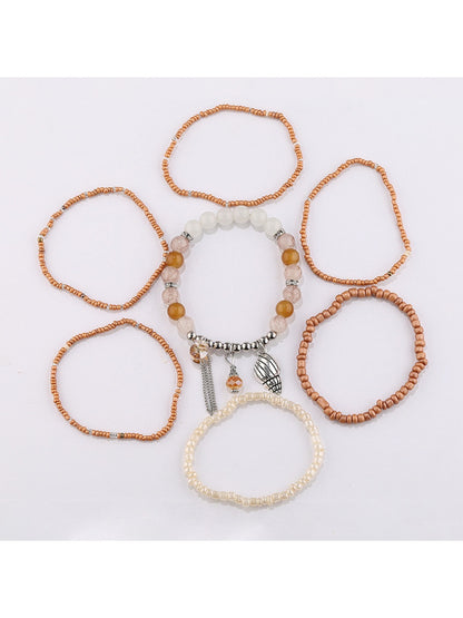 Close-up of Lovra bracelet showing detailed alloy pendant and textured silver beads