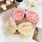 Beau Polka Dot Bow Claw Clip open, displaying claw teeth