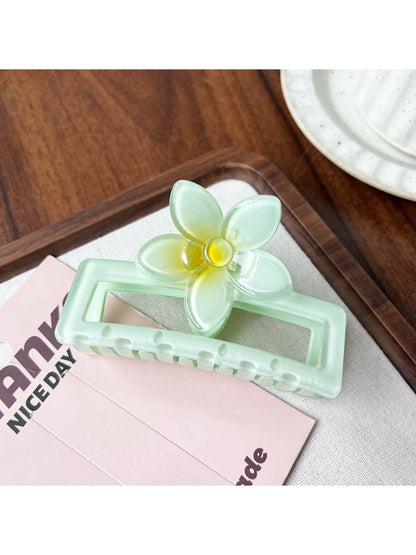 Beau square ombre flower shaped claw clip displayed alongside matching hair accessories