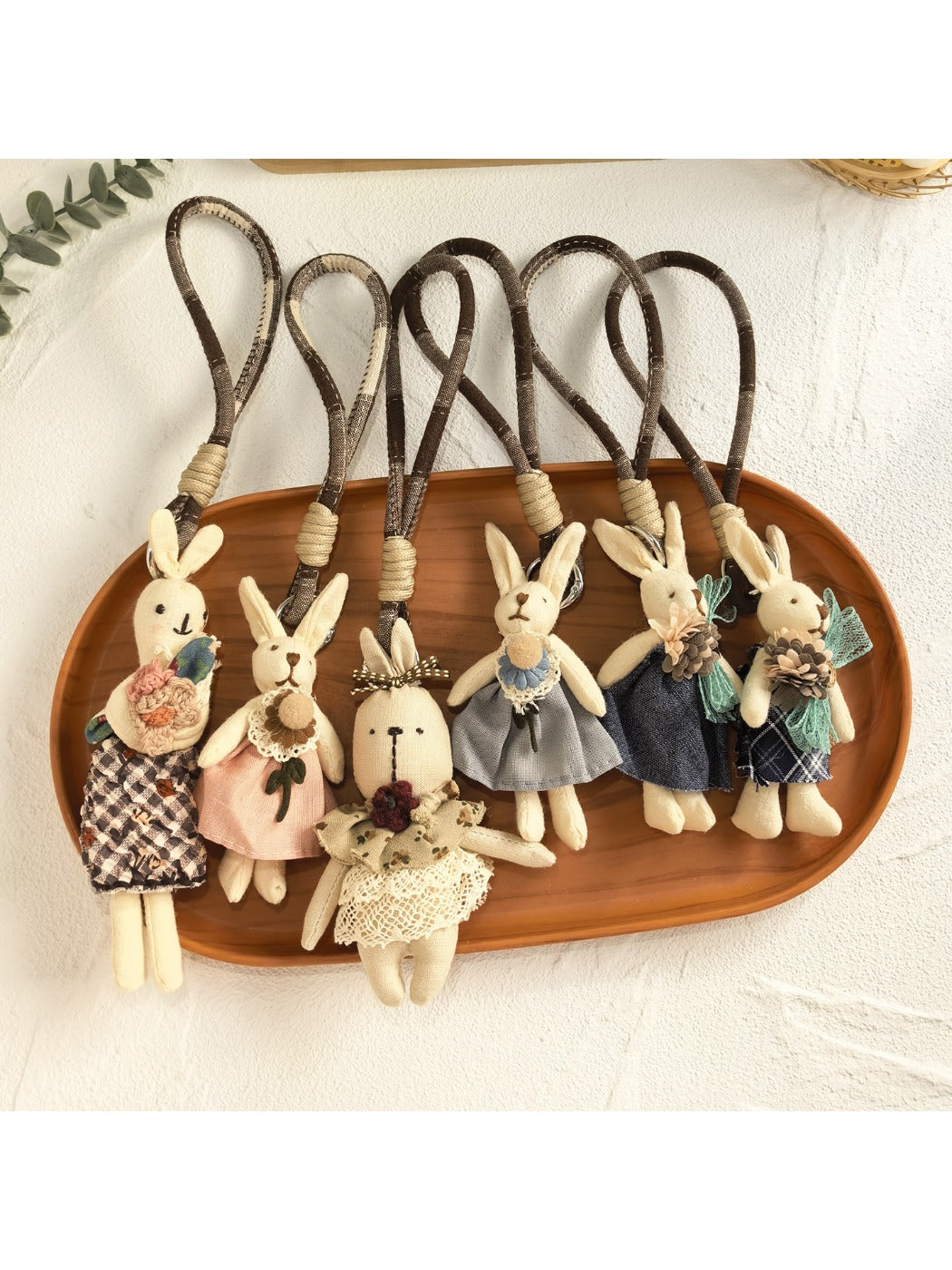 Minimalist bunny-shaped pendant keychain on a silver keyring