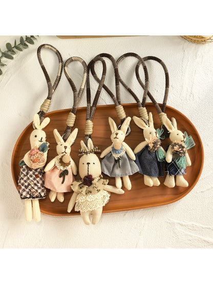 Minimalist bunny-shaped pendant keychain on a silver keyring