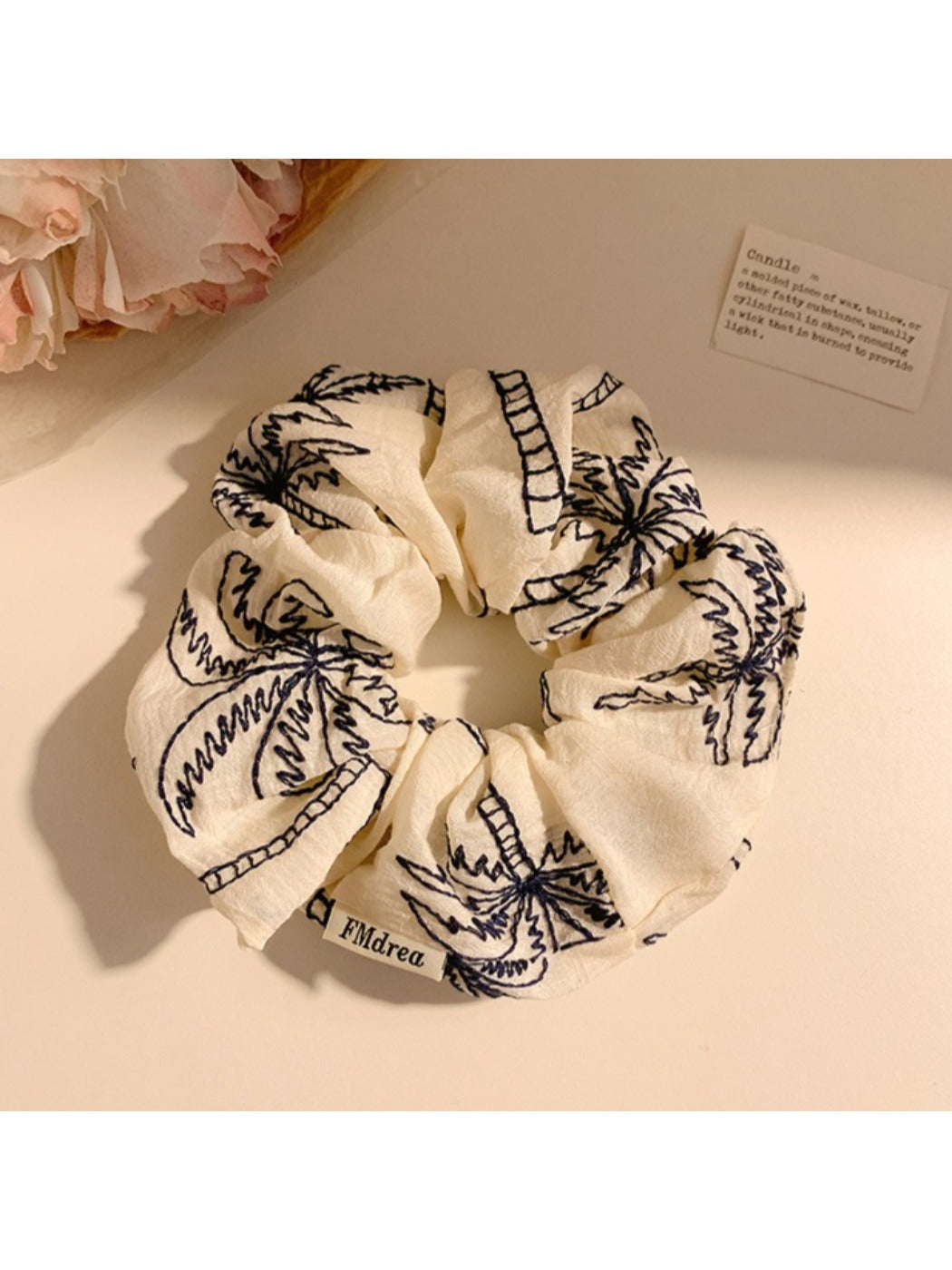Vintage coconut tree print scrunchie displayed on white background