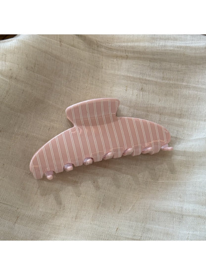 Beau Sweet Polka Dot Stripe Claw Clip clipped in long hair from back view