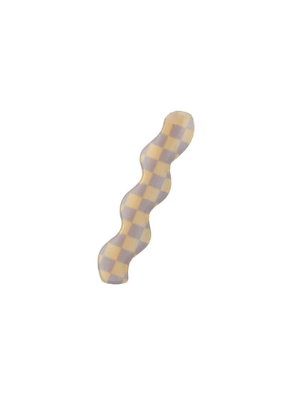 Top view of Beau wavy hair clip highlighting smooth texture
