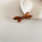 Close-up of clasp and hinge of Beau retro bow acetate hair clip