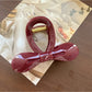 Beau - Cutout Bow Tie Hair Claw Clip