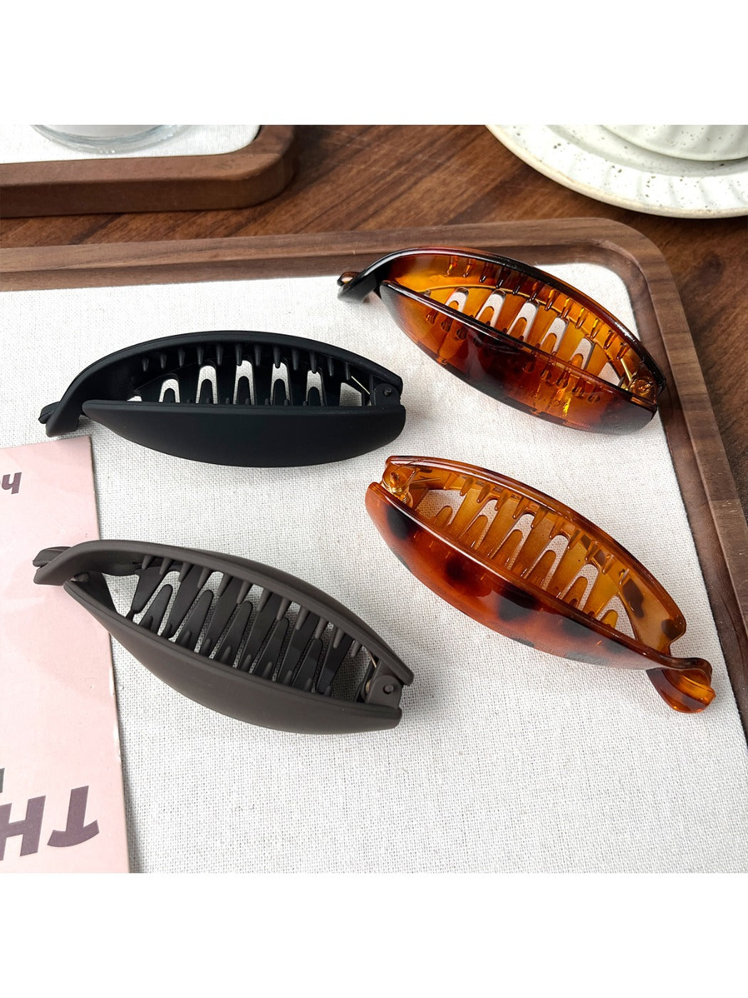 Close-up of Beau high ponytail hair clip showing smooth matte finish