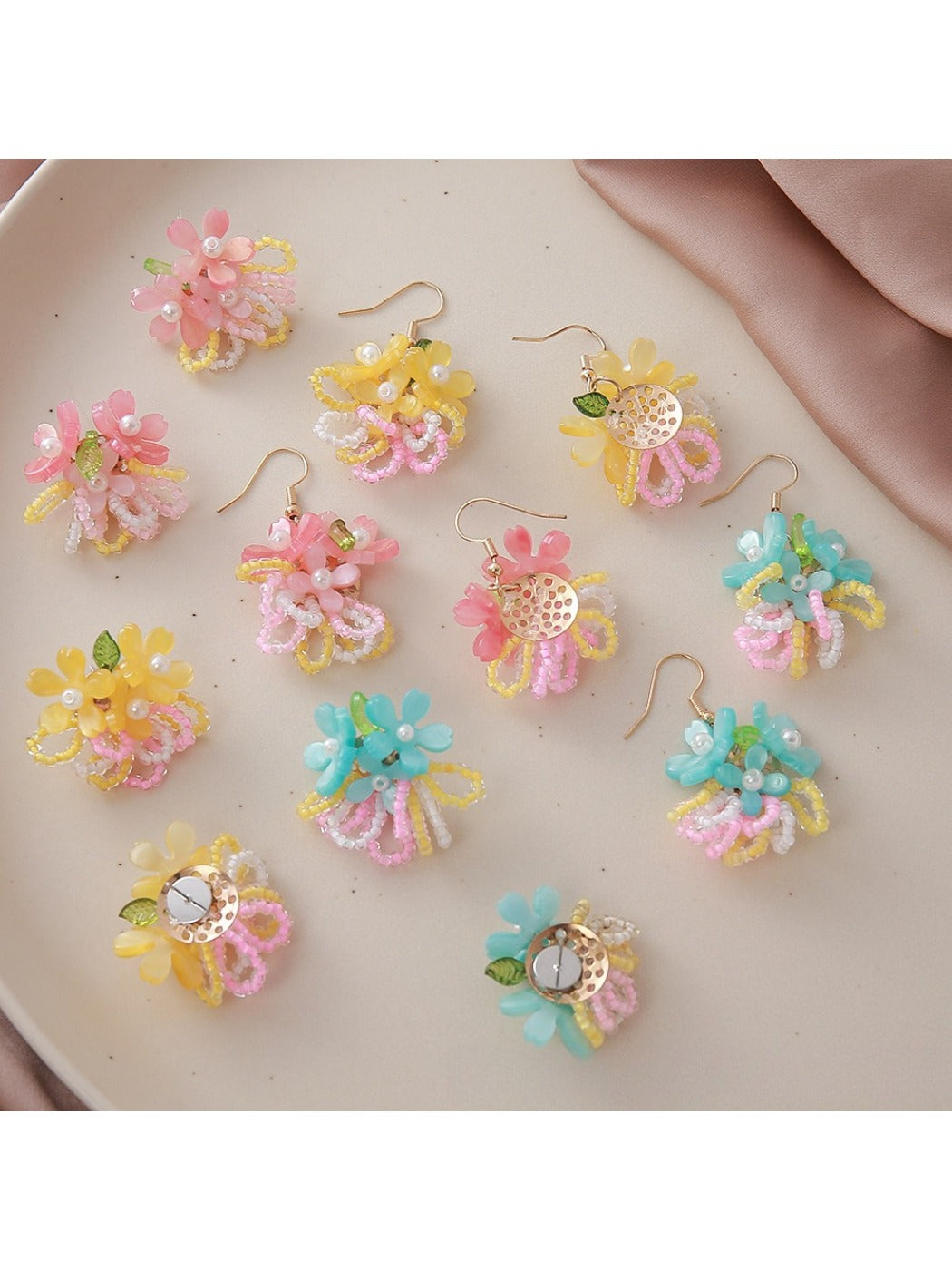 Side view of Earedge small beaded flower cluster earrings showing detailed beadwork