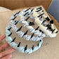 Gifty vintage style checkered headband folded on a white background