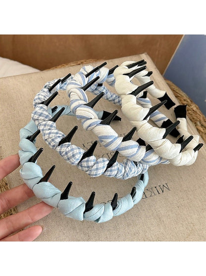 Gifty vintage style checkered headband folded on a white background