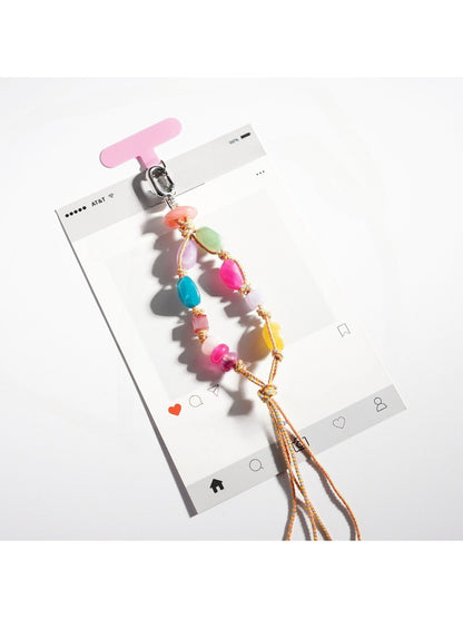 Keychain featuring vibrant resin beads in various shapes and colors
