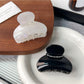Beau classic half round hair claw clip in matte black, side view