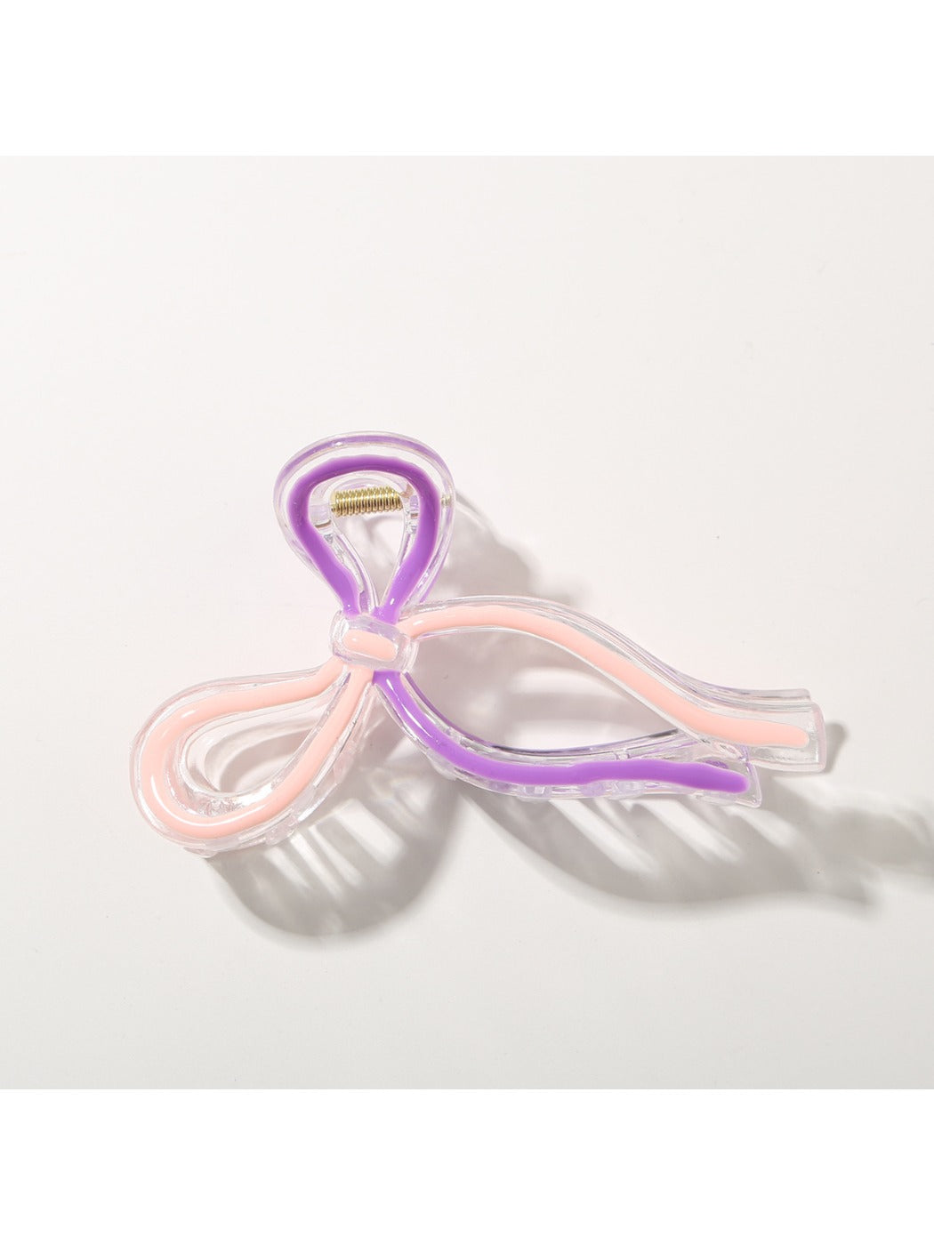 Beau Sweet Ribbon Knot Hair Clip in light pink with subtle fabric sheen