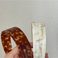 Side view of Gifty vintage wide headband highlighting its width and fabric detail