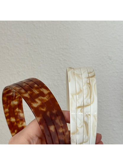 Side view of Gifty vintage wide headband highlighting its width and fabric detail