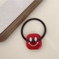 Gifty - Block Smiley Face Hair Tie
