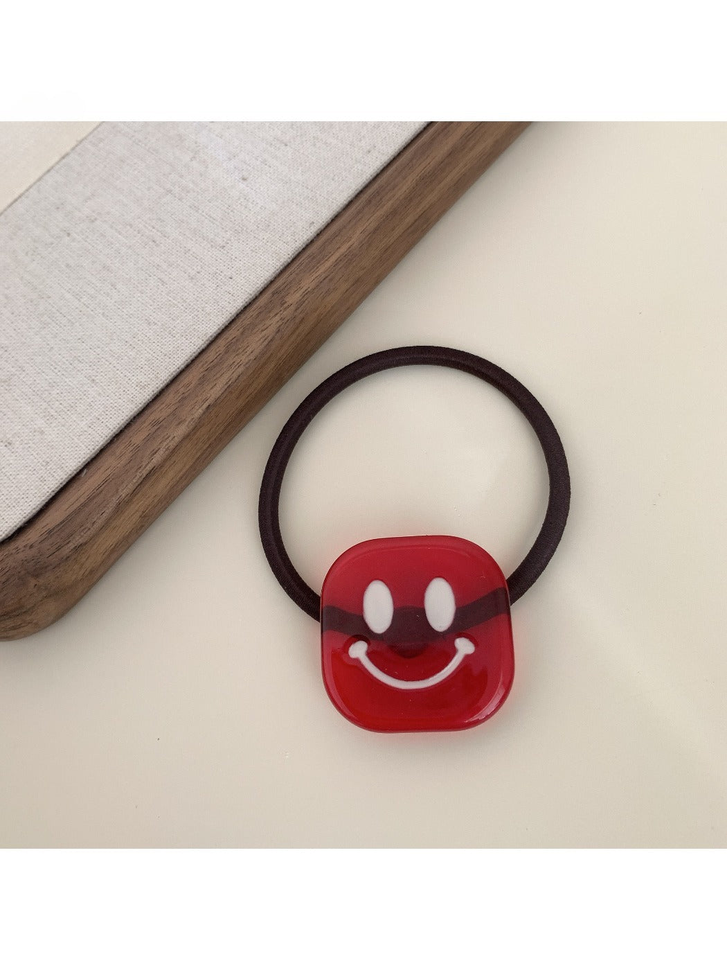 Gifty - Block Smiley Face Hair Tie