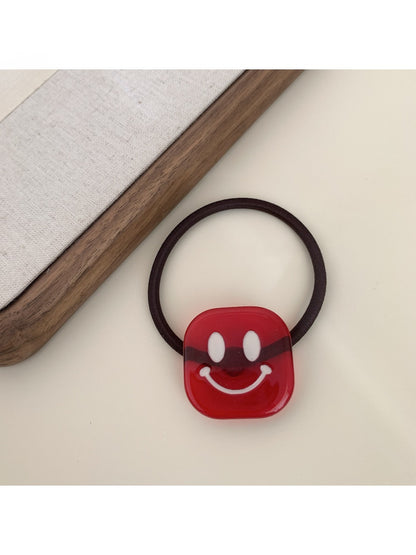 Gifty - Block Smiley Face Hair Tie
