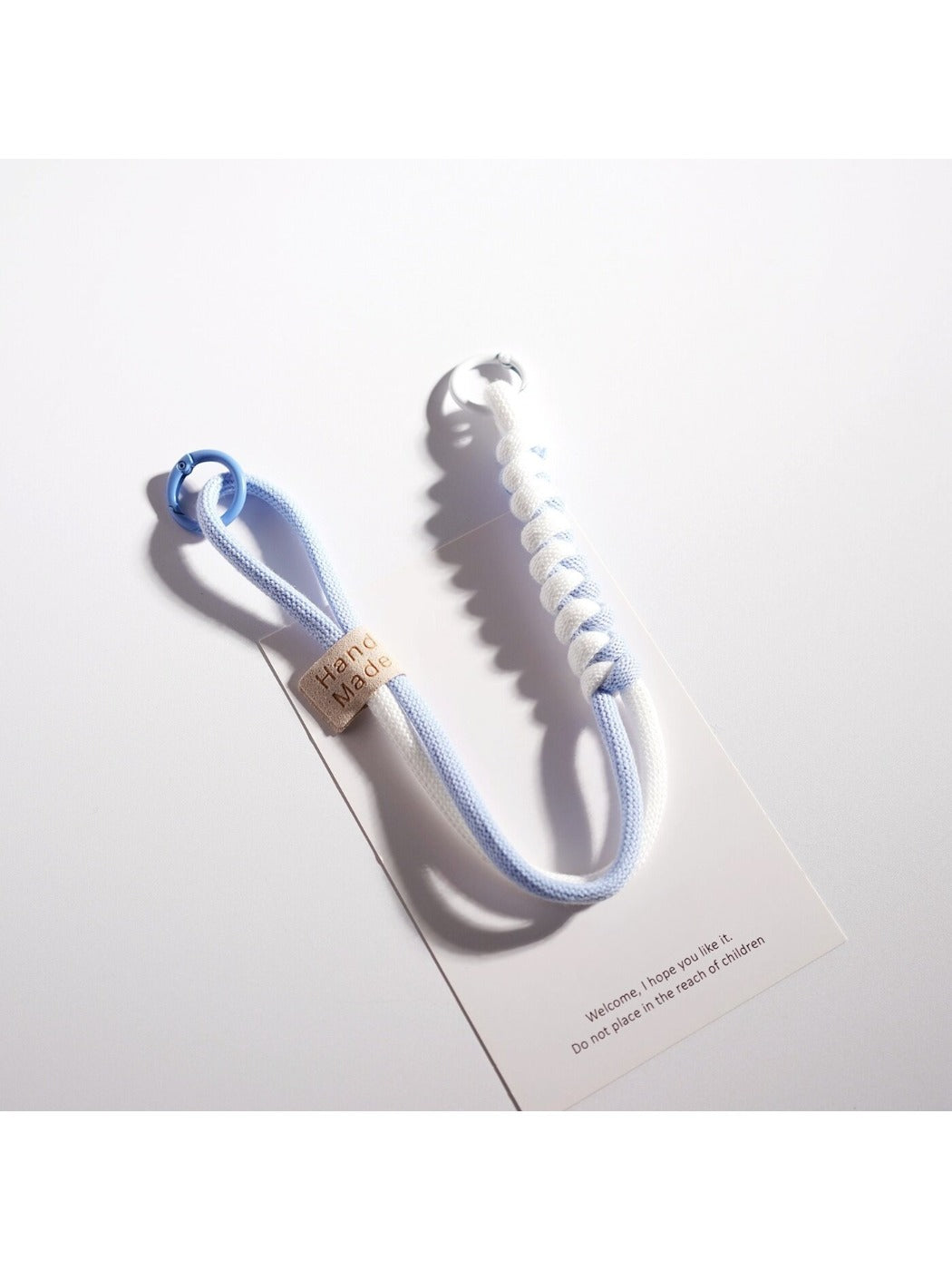 Close-up of twisted colorful rope texture on keychain