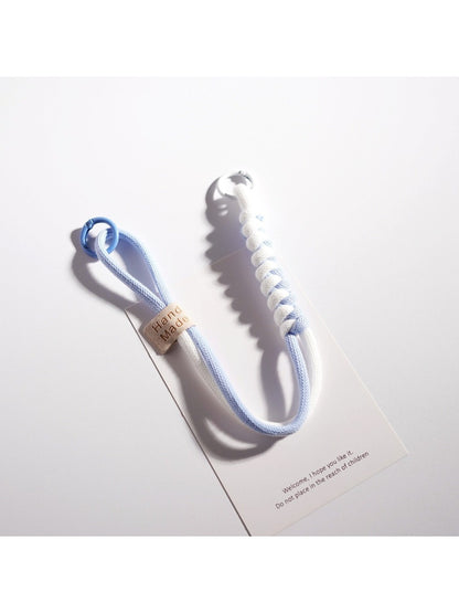 Close-up of twisted colorful rope texture on keychain