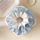 Blue double layer scrunchie displayed flat showing layers