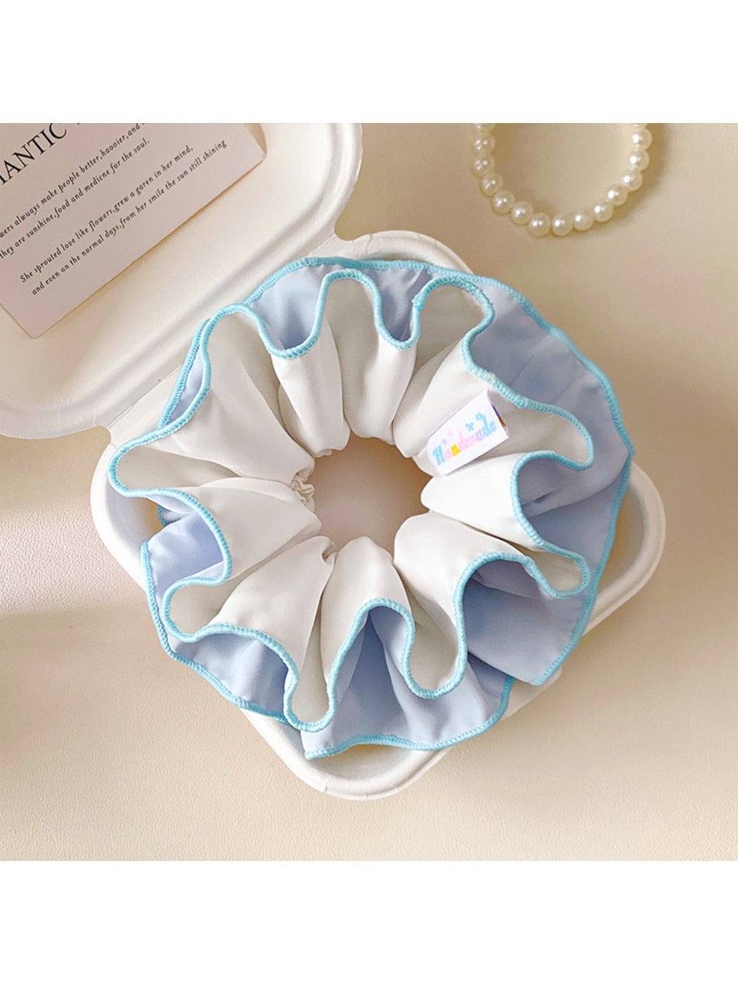 Blue double layer scrunchie displayed flat showing layers