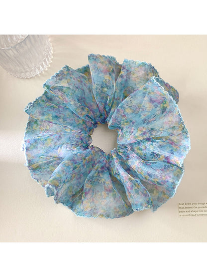 Gifty scrunchie displayed flat showing full floral vintage print design