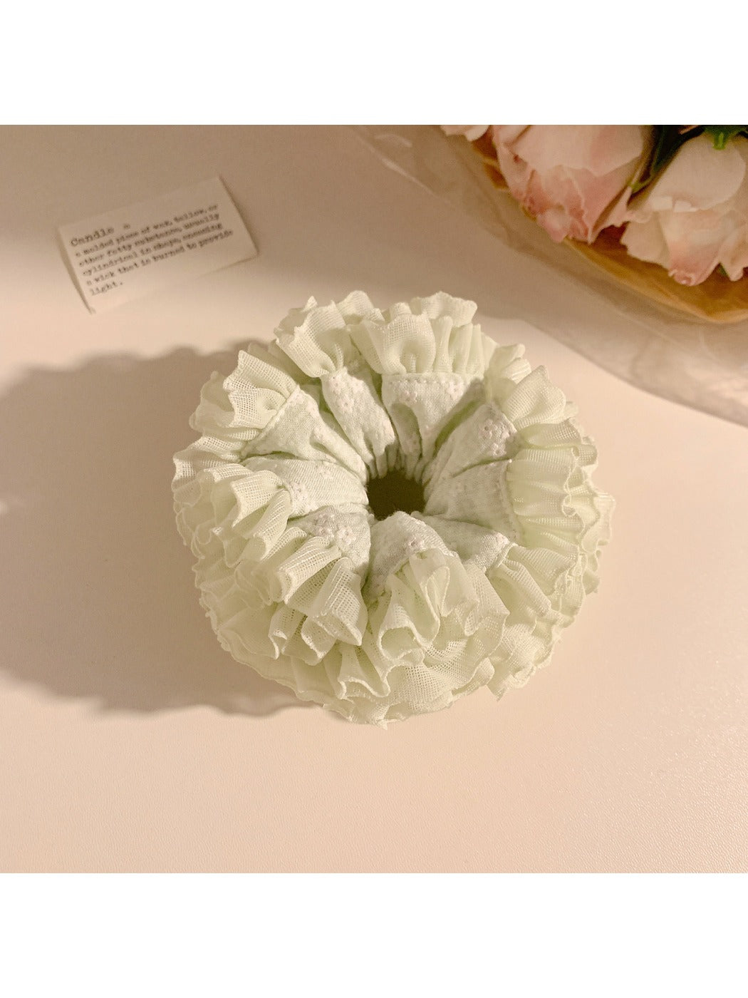 Gifty sweet printed scrunchie styled in a ponytail with soft pastel colors