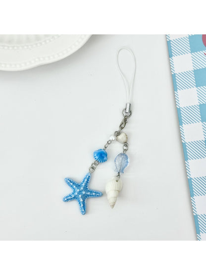 Mini starfish keychain shown from a side angle
