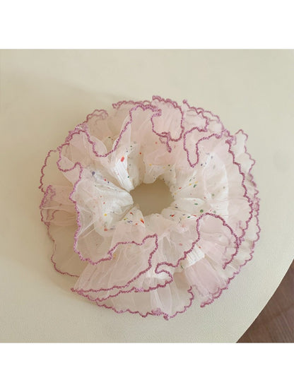 Gifty colorful polka dot tulle scrunchie shown from side angle