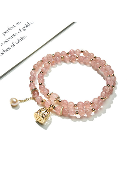 Side view of Lovra pink crystal beaded bracelet showcasing the colorblock pattern