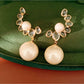 Earedge - Modern Curved Round Drop Look Stud Earrings