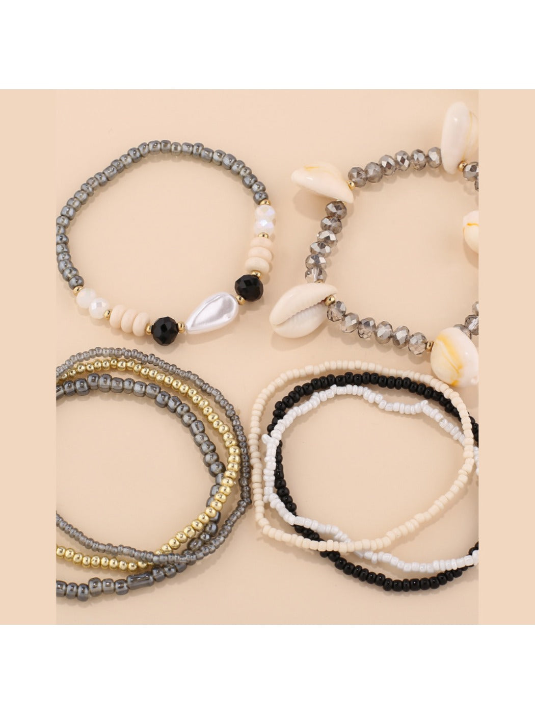 Lovra beaded bracelet featuring natural shell pieces and colorful beads