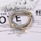 Lovra multi-row bracelet with a mix of pastel and bright beads on a neutral background
