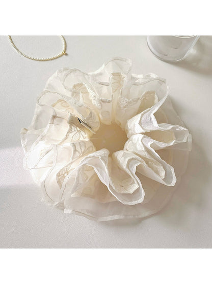 Gifty flower scrunchie displayed on a white background highlighting floral embroidery