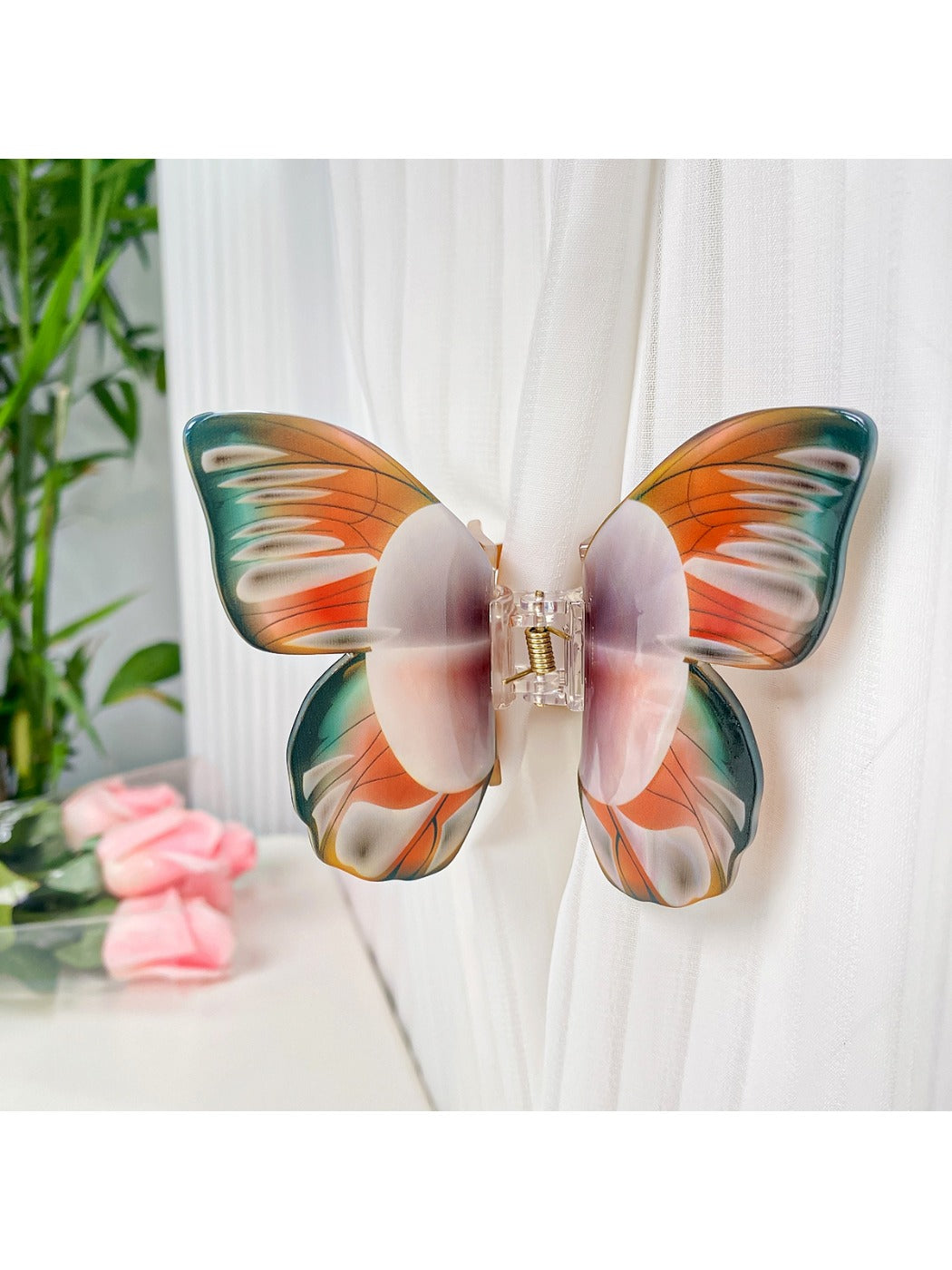 Top view of Beau butterfly hair claw clip emphasizing symmetrical wings