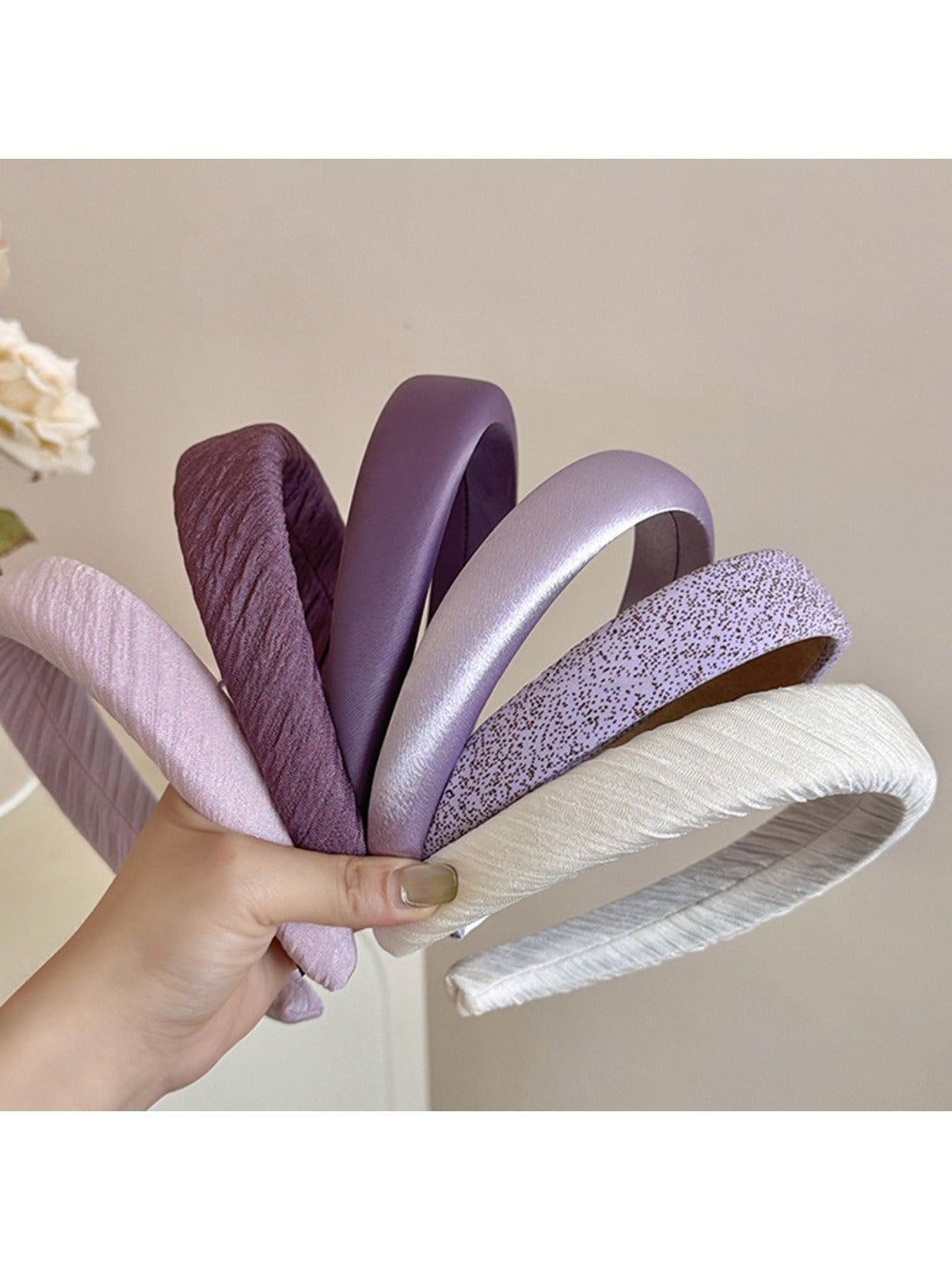 Close-up of purple fabric texture on wide edge headband