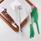 Side view of Camerow acetate hair comb showing smooth curved teeth